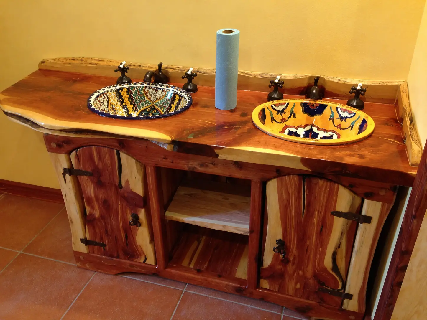 Installed custom cedar double vanity with two vessel sinks