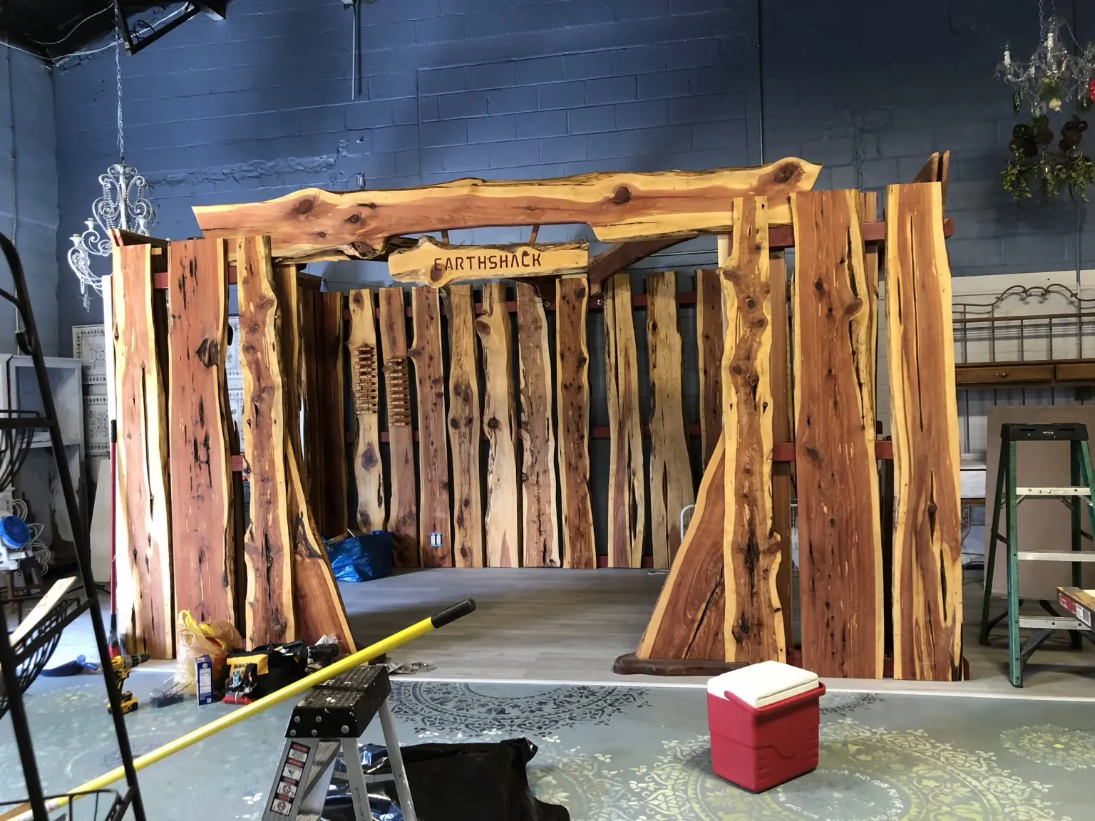 Full front view of the Earth Shack live-edge retail display during construction