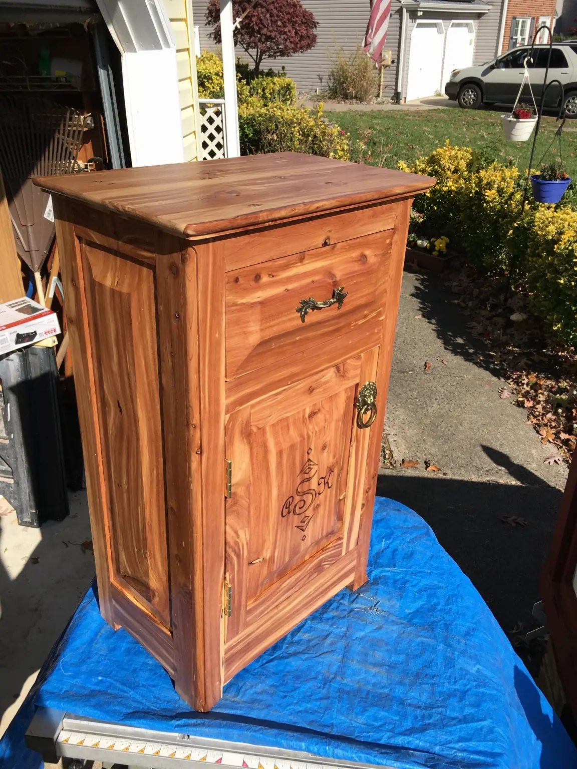 Handcrafted cedar cabinet with decorative hardware