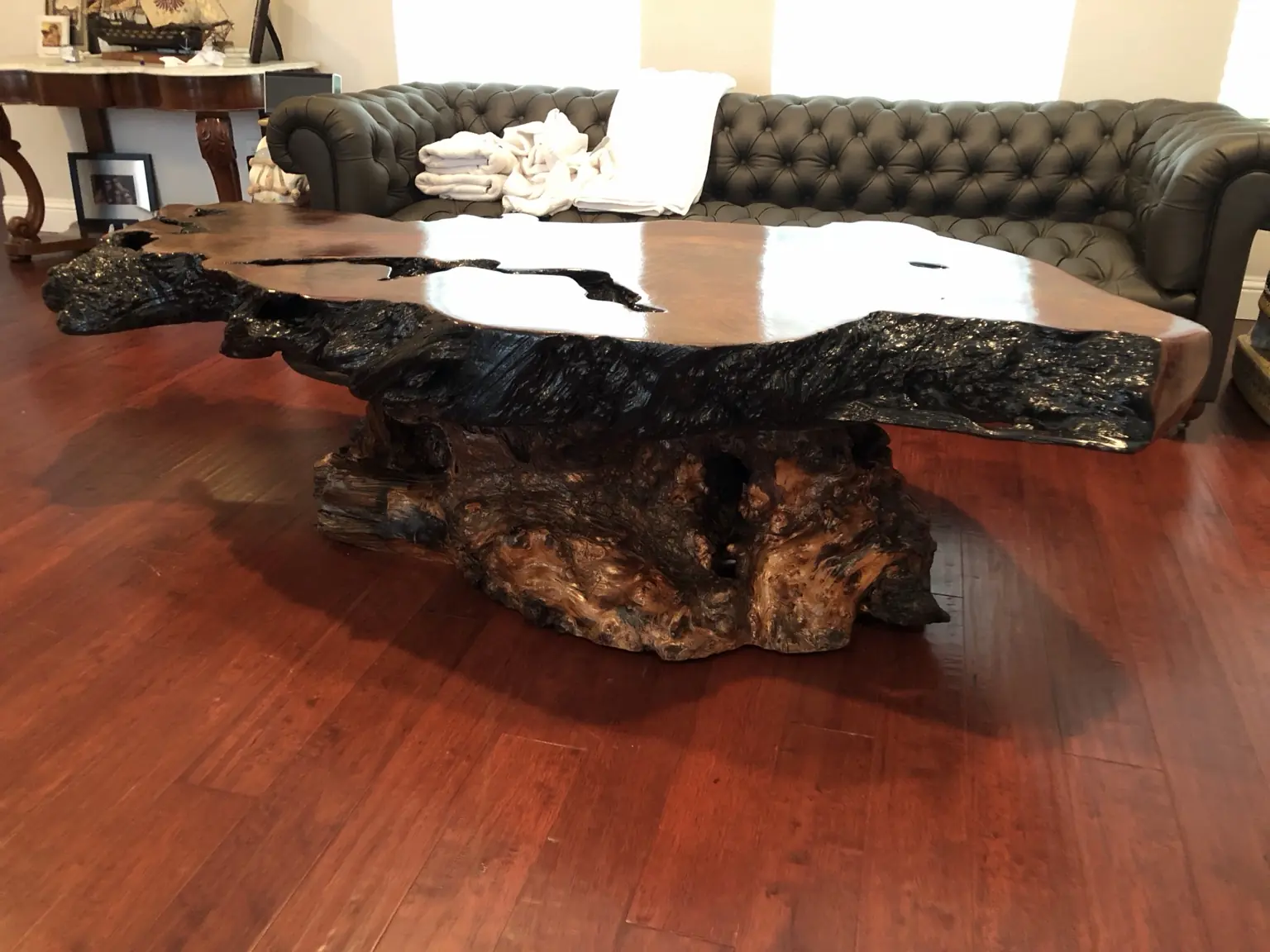 Restored live-edge coffee table with a natural root base
