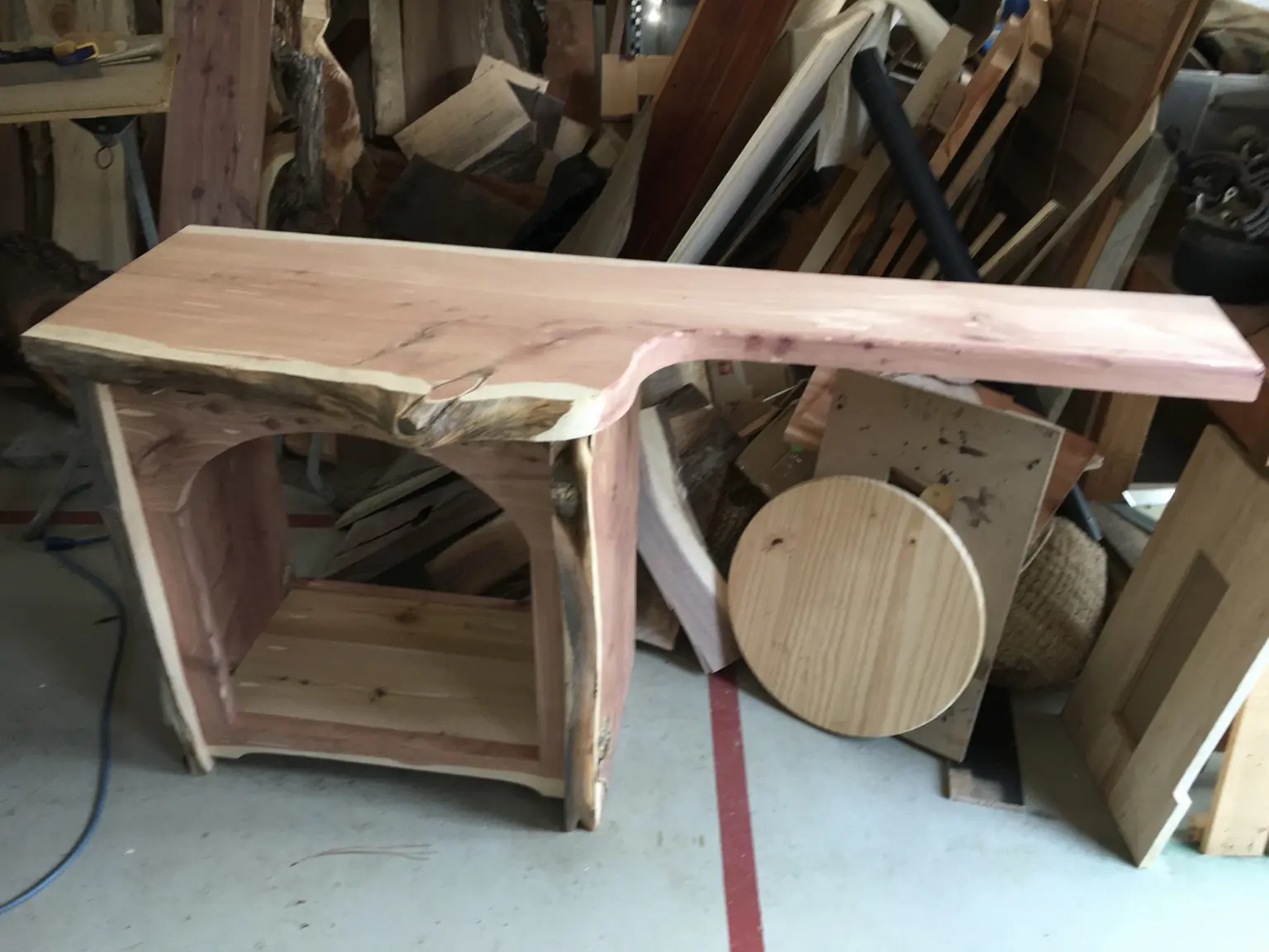 Custom live-edge cedar desk during construction