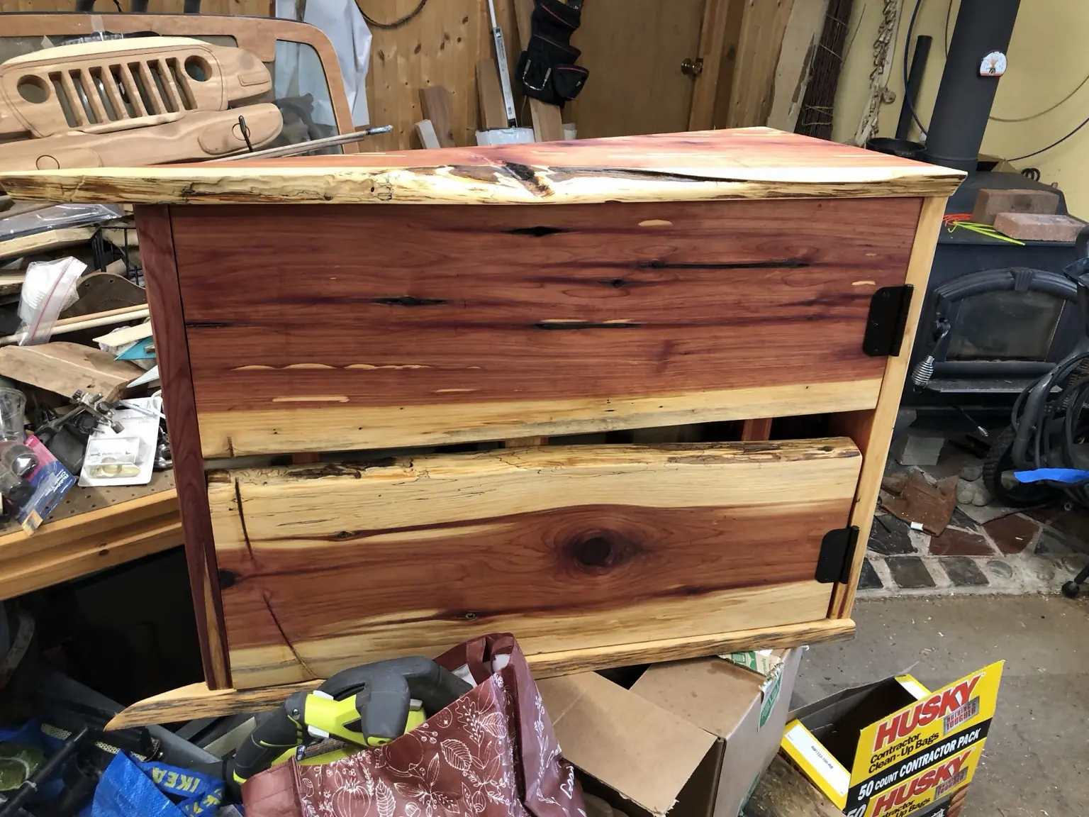Handcrafted live-edge cedar wall cabinet with two doors